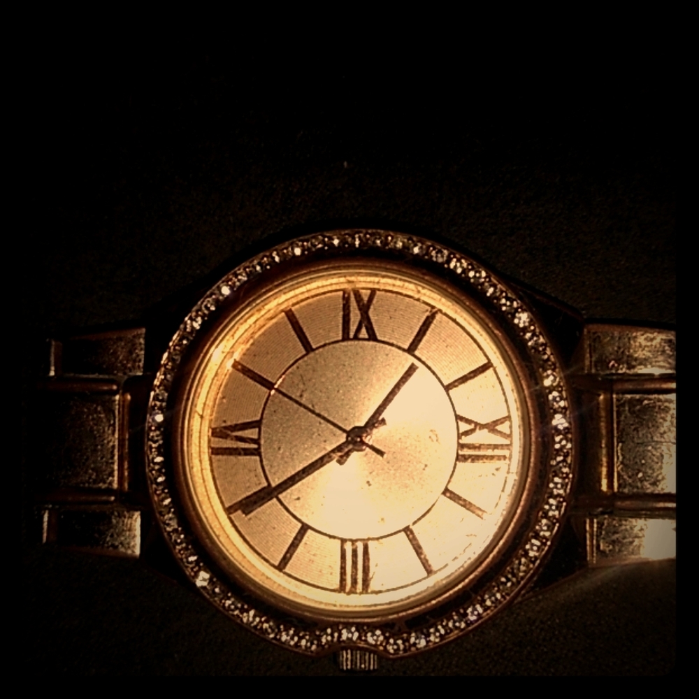 Golden watch with diamonds